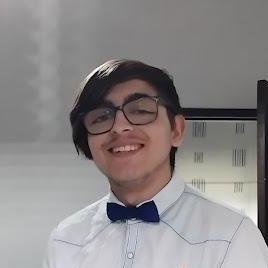 Miguel wearing a shirt and bowtie